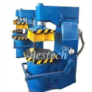 Stroj za oblikovanje peska za posodo